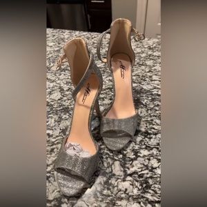 Brand new silver high heels